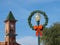 An Old Lamppost, Wreath and Town Clock Tower