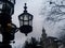 Old lantern lamppost and historic building in City Hall Park in lower Manhattan New York City