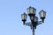 Old lantern. Street lamp background blue sky