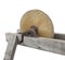 Old large grinding wheel isolated.