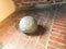 Old large stone ancient medieval iron martial round spherical cannonball