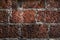 Old laterite wall laterite texture background,Pattern decorative uneven cracked real stone wall surface