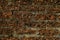 Old laterite wall laterite texture background,Pattern decorative uneven cracked real stone wall surface with cement