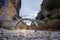 Old Lazaridi - Kontodimou arched stone bridge on Vikos canyon, Zagorohoria, Greece.