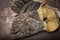 Old leather gloves for welders on rusty table