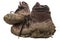 Old leather work hiking boots isolated mud