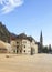 The old Liechtenstein Parliament building and the tower of the Cathedral of Saint Florin at sunset.