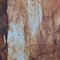 Old light blue painted grey rusty rustic rust iron metal frame background texture, vertical aged damaged weathered scratched