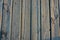 Old Light wooden board with well visible structure of wood covered with frost