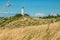 Old lighthouse Dornbusch on sunny summer day. Hiddensee, Baltic Sea.