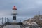 Old lighthouse in Laukvik in gray weather, Lofoten, Nordland, Norway