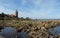 An old Lighthouse made of bricks near by the ocean. You can find this lighthouse when you travel around at the island bornholm