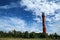 The old lighthouse standing on the shore in Paldiski