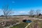 Old limestone stonebridge in a plain landscape