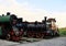 Old locomotive iron equipment rusty machine train parking closeup background