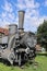 Old locomotive next to the railway station