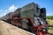 Old locomotive on the rural railway