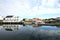 Old Lofts mirroring in Henningsvaer\'s harbour