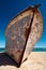 Old lonely boat abandoned at seacoast