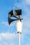 Old loudspeakers on the pole against the blue sky