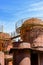 Old machinery tanks and infrastructure of an iron ore handling industry