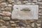 Old mailbox on stone facade