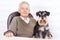 Old man with black Miniature Schnauzer Dog