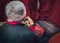 Old man buddhist monk`s hands in prayer gesture