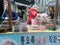 Old man cooking for people on street in myeongdong market in chu