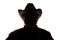 Old man in cowboy hat, front view - dark close-up silhouette