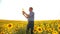 Old man farmer sunflower oil concept agriculture. old man farmer holding in hand a plastic bottle sunflower oil stands