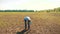 Old man farmer working peasant hands holding fresh soil. slow motion video. old man ground dirt keeps the soil Symbol of
