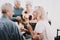 Old Man Giving Rose to Woman in Waiting Room.