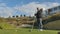 Old man with golf club at golf course