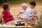 Old Man Grandpa With Family Taking Medicine Pill For Heart