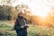 Old man photojournalist poses with his photo camera