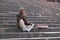 Old man relaxing at Jama Masjid Mosque, Delhi