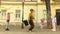 Old man rope skipping with three girls.