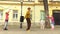 Old man rope skipping with three girls.