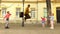 Old man rope skipping with three girls.