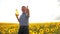 Old man sunlight farmer sunflower oil concept agriculture. old man farmer holding in hand a plastic bottle sunflower oil