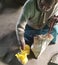 A old Man taking Fhofi is just salty joyful food items in arer madhubani India