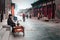 Old man with a tricycle in a street of Pingyao, China.