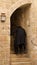 Old man walking up the stairs in the Jewish Quarter in the Old City of Jerusalem, Israe