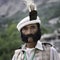 Old man wearing traditionl chitrali topi hat and mutton chops beard, northern Pakistan, taken on 14th of August 2019