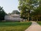 Old manor with columns in a green park. Wolsztyn, Poland