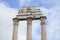 Old marble ruins of columns in Rome city