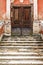 Old marble staircases and wooden door