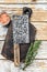 Old meat butcher cleaver. White wooden background. Top view