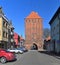 Old mediaeval gothic red brick stone Koszalinska tower in a small town of Slawno, wester Pomerania, Poland.
